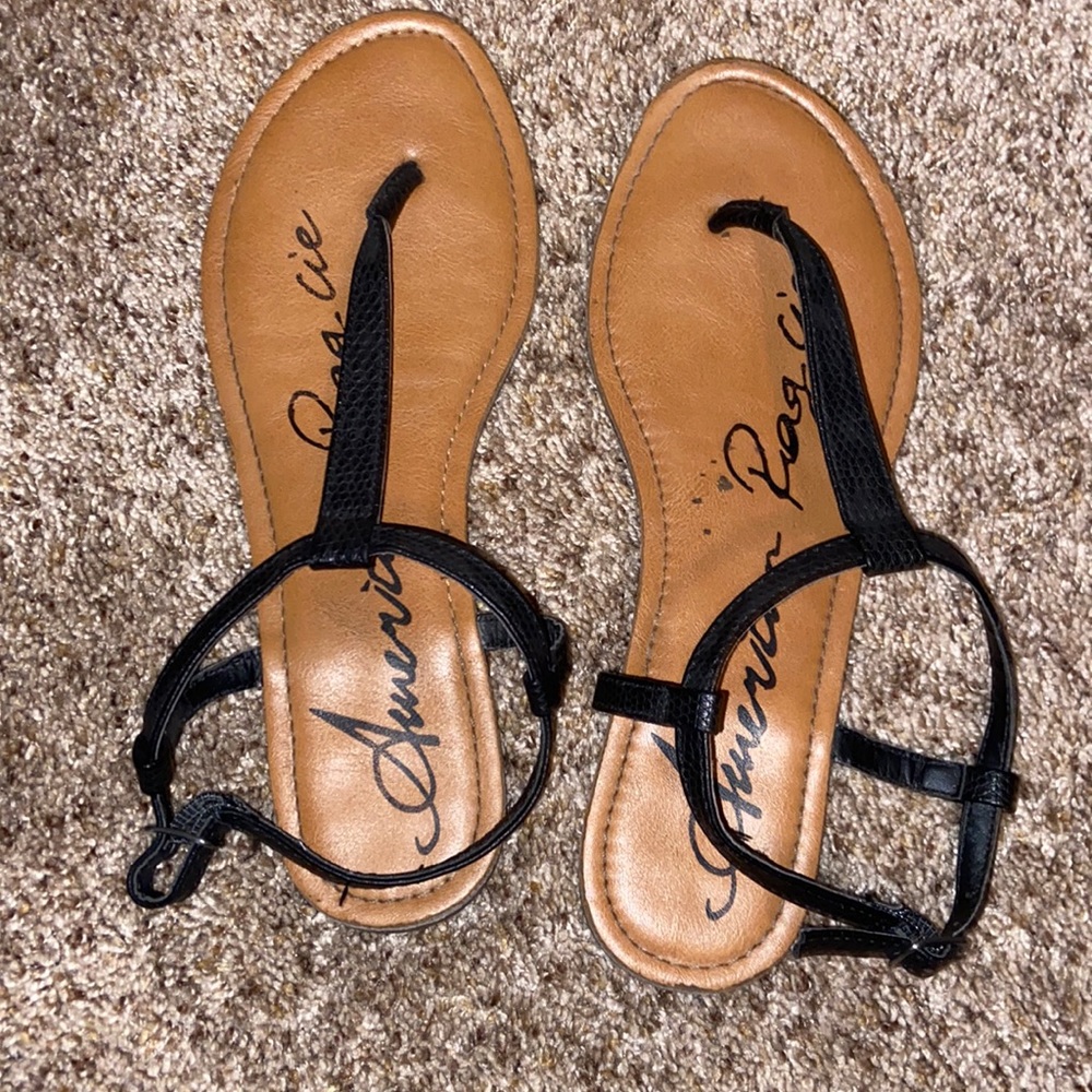 Black snake print American Rag Cie sandals.